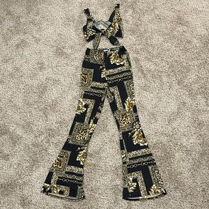 Fashion Nova Black and Gold Flare Jumpsuit